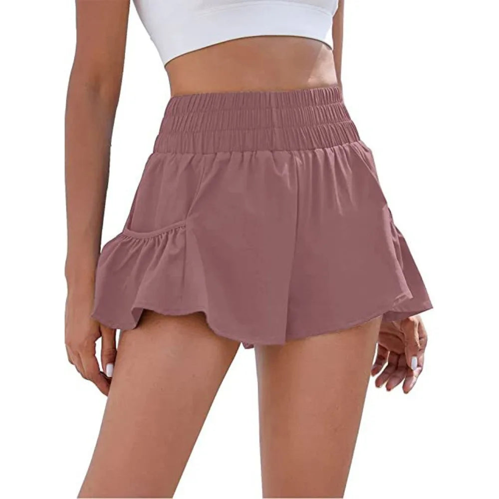 Pantalones cortos deportivos de mujer de cintura alta para correr, para gimnasio, de secado rápido, fluidos, con bolsillos