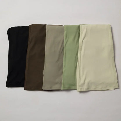 Conjuntos de dos piezas Naked Feeling para mujer, top corto acolchado, pantalones acampanados con efecto push-up, chándal de yoga, conjunto de gimnasio y ropa deportiva para mujer
