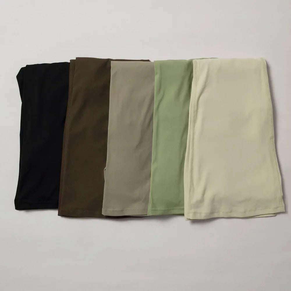 Conjuntos de dos piezas Naked Feeling para mujer, top corto acolchado, pantalones acampanados con efecto push-up, chándal de yoga, conjunto de gimnasio y ropa deportiva para mujer
