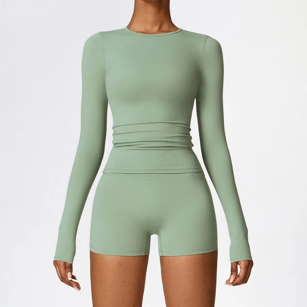 Camiseta de yoga de manga larga de alta intensidad para mujer con forro cepillado, para Pilates, correr y entrenamiento cruzado, tipo crop top deportivo