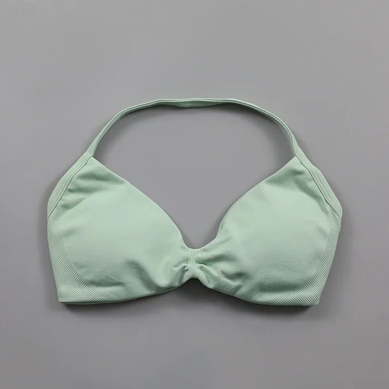 Sujetador deportivo tipo halter con tirantes y escote en V para mujer, soporte bajo, fruncido, espalda abierta sexy, top corto de gimnasio, copas acolchadas, sin costuras, para entrenamiento o yoga