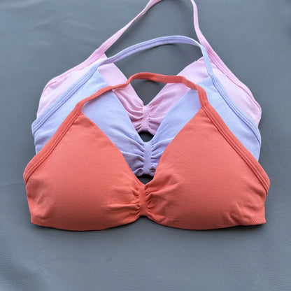 Sujetador deportivo tipo halter con tirantes y escote en V para mujer, soporte bajo, fruncido, espalda abierta sexy, top corto de gimnasio, copas acolchadas, sin costuras, para entrenamiento o yoga