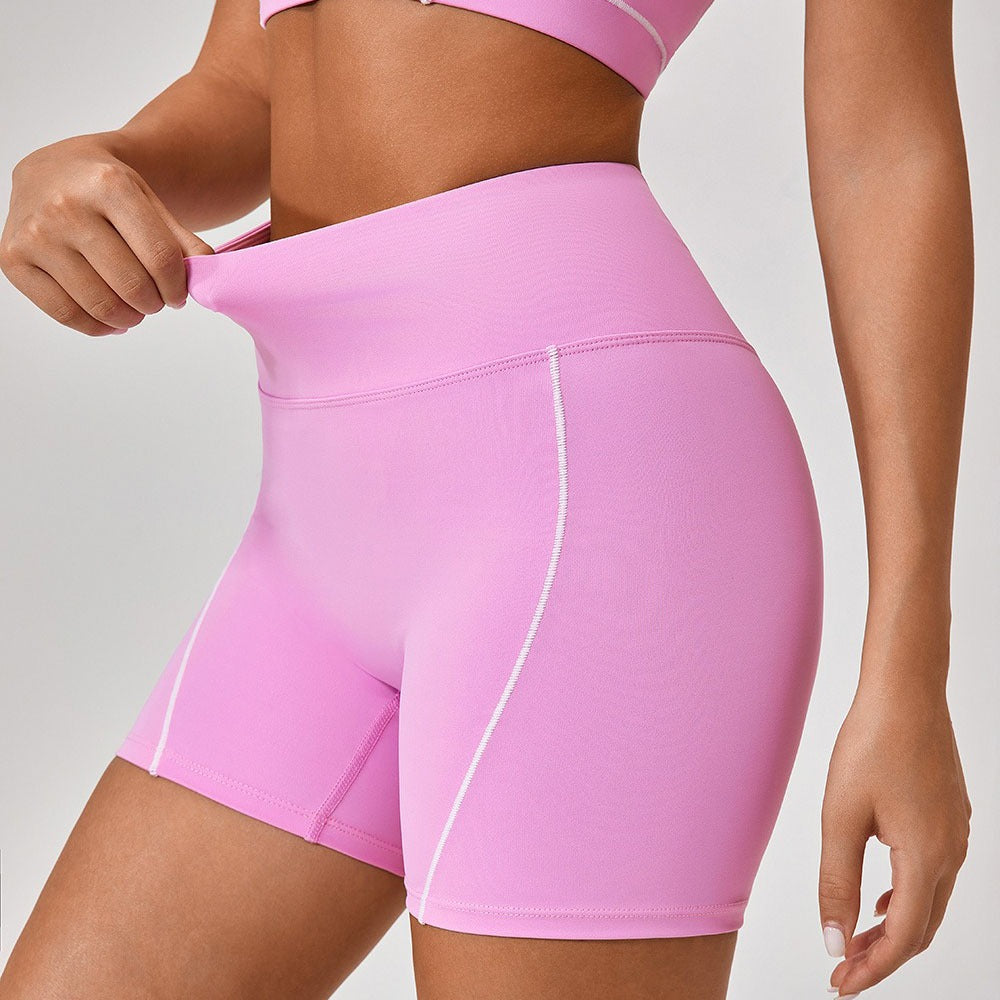 Conjunto de top deportivo y shorts con borde blanco